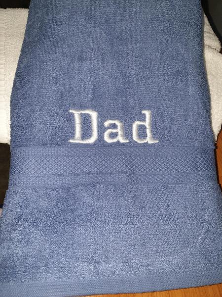 Medium blue embroidered towel